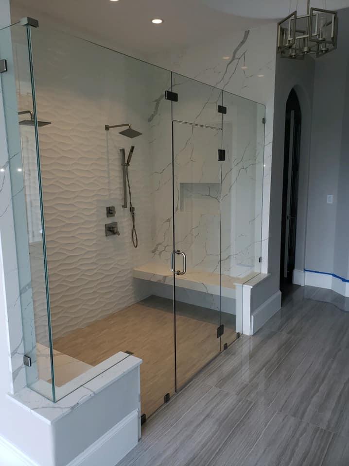 Complete bathroom transformation with custom vanity and designer tile